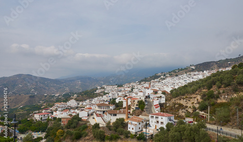 The traditional Spanish Mountain Village of Sayalonga in Andalucia with its many Villas and Houses seemingly tumbling down the Hills.