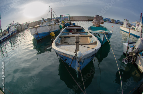 Fishing boats at old Jaffa port. Fisheye photo