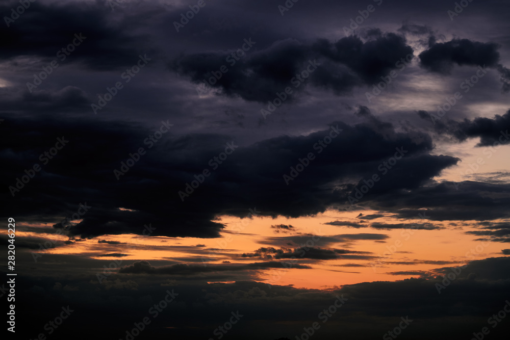 Beautiful sunset - dark sky with clouds and sunlight Beautiful sunset - dark sky with clouds and sunlight