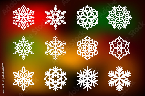 Christmas set with a snowflakes cut out of paper. Templates for laser cutting, plotter cutting or printing. Festive background.