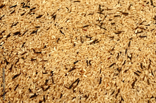 Texture of black and white rice. Solid background