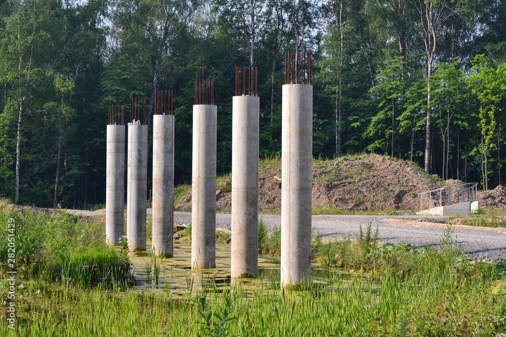 Fragment of the construction of an automobile bridge over the road Fragment of the construction of an automobile bridge over the road