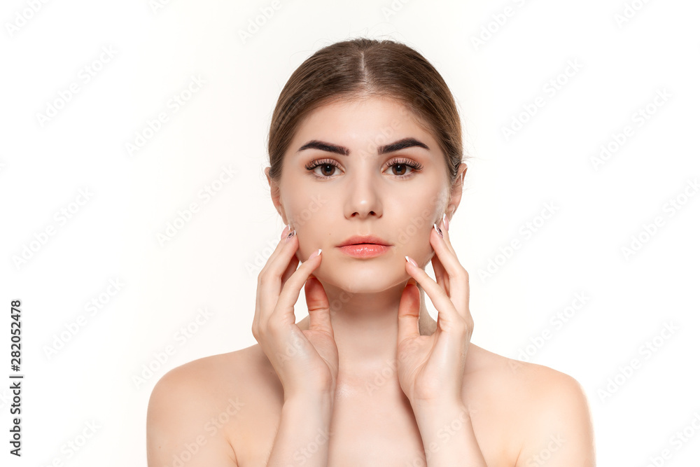 Close-up portrait of a beautiful young girl with holding hands near face isolated over white background. Close-up portrait of a beautiful young girl with holding hands near face isolated over white background.