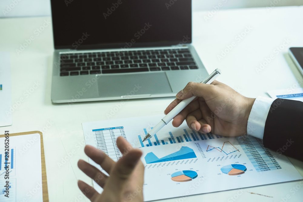 Asian business adviser meeting to analyze and discuss the situation on the financial report in the meeting room.Investment Consultant,Financial Consultant,Financial advisor and accounting concept Asian business adviser meeting to analyze and discuss the situation on the financial report in the meeting room.Investment Consultant,Financial Consultant,Financial advisor and accounting concept