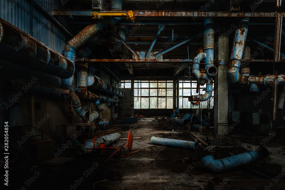 Dark industrial interior of factory in Chernobyl