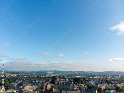 Fototapeta Naklejka Na Ścianę i Meble -  Aerial photo of the Leeds town of Pudsey in West Yorkshire, England showing typical British streets and business taken on a sunny bright summers day.
