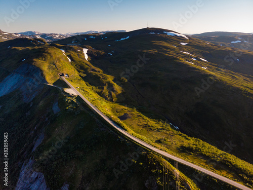 Road with tunnel in mountains Norway. Aerial view. photo