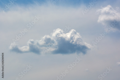 A beautiful, lonely, fluffy cloud in the blue sky