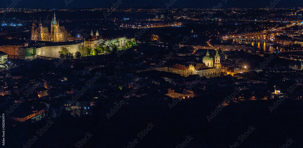 Aerial cityscape of Prague by night