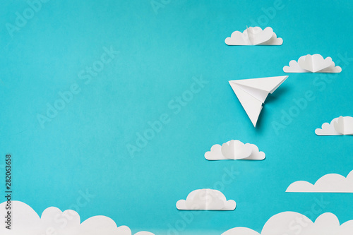 Paper cut clouds and origami planes. Creative concept for banner/landing/background designs.