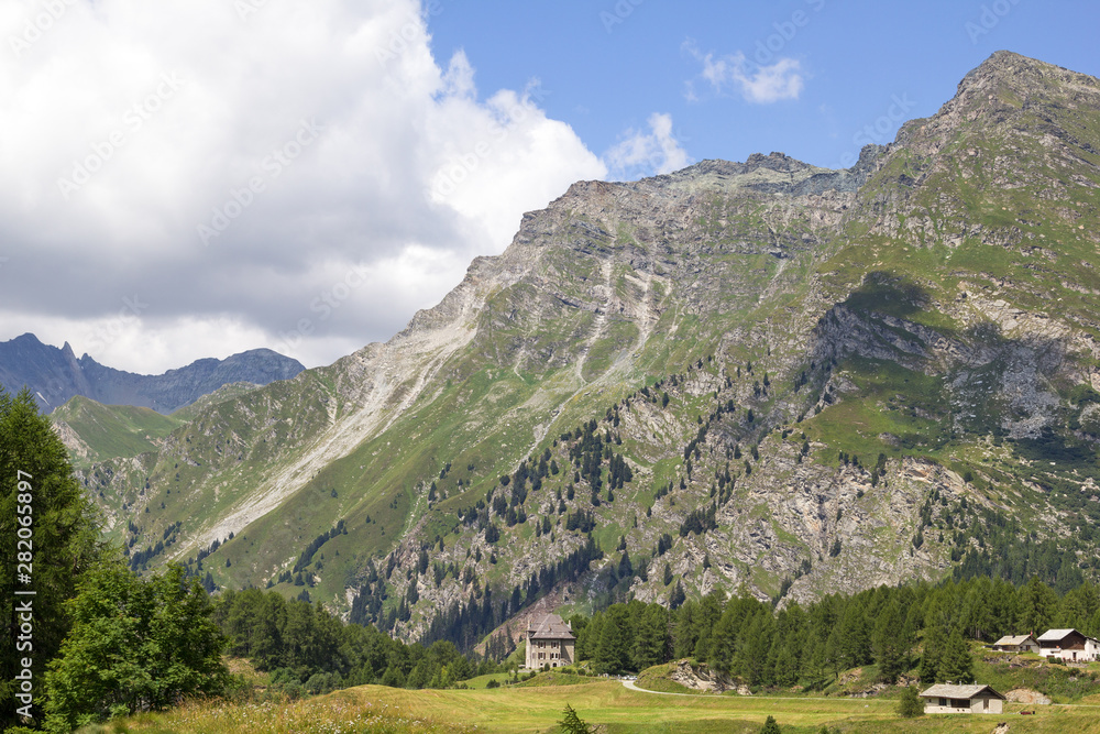 Beautiful landscape on the Alps mountain height in sunny summer season