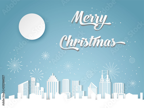 Christmas and happy new year blue vector background with cityscape and fireworks celebration concept, paper art design
