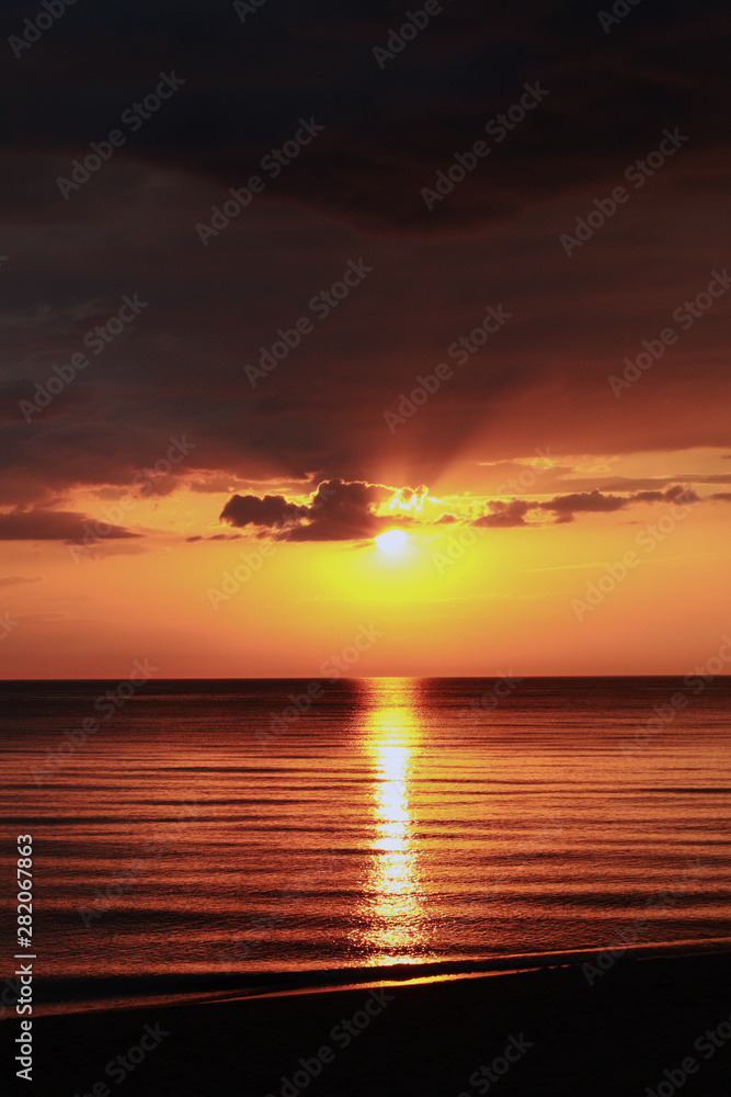 Epic golden sunset over the Baltic sea