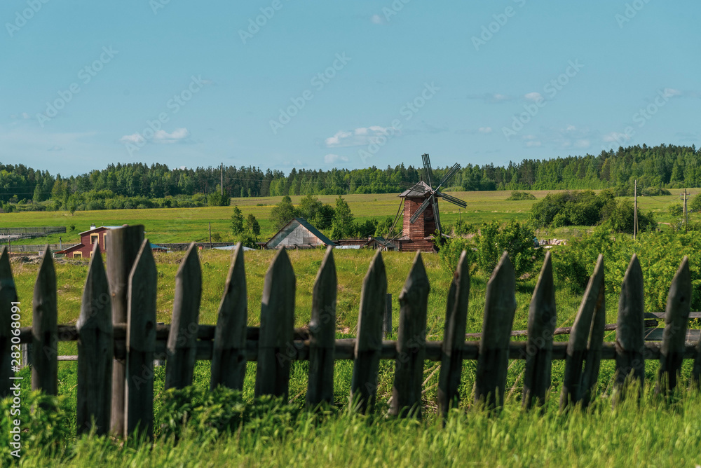 Wooden fence in the field