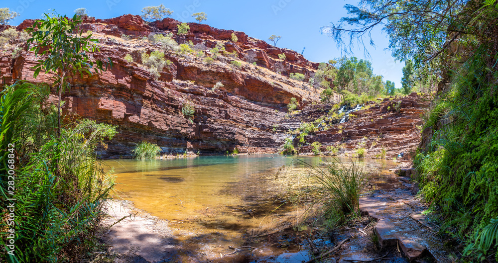 Panorama of Fortescue Falls and pool at the bottom of Dales Gorge at Karijini National Park