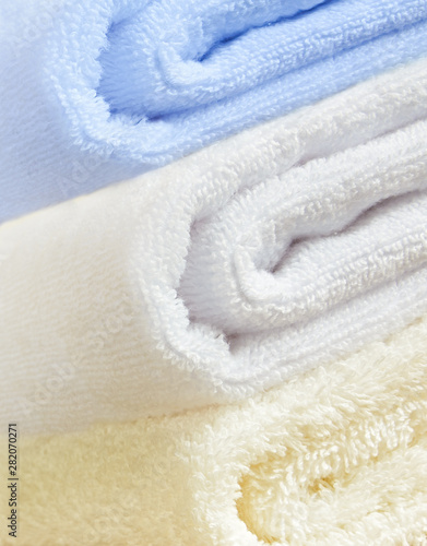 Stacked colorful pastel bath towels