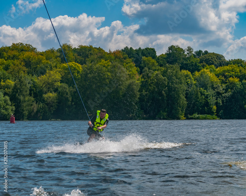 A man riding wakeboard