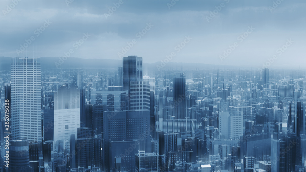 Futuristic skyscraper building city skyline, with glowing blue light. Abstract city background Futuristic skyscraper building city skyline, with glowing blue light. Abstract city background