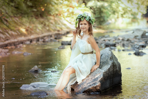 Portrait of a girl in the image of a forest nymph