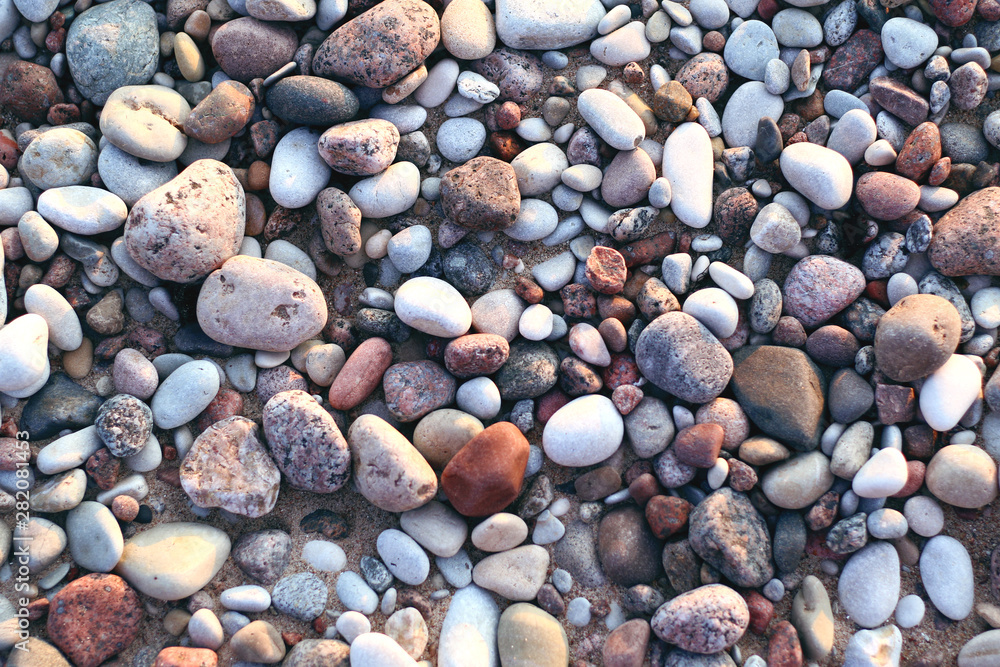 smooth colorful pebbles on the beach smooth colorful pebbles on the beach