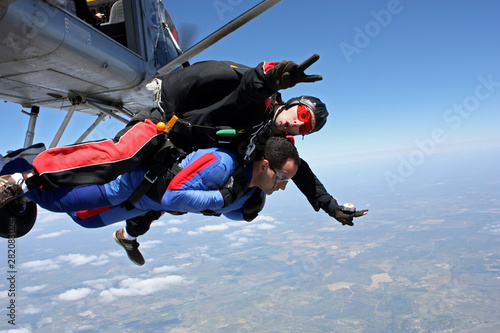 Skydive tandem two friends together