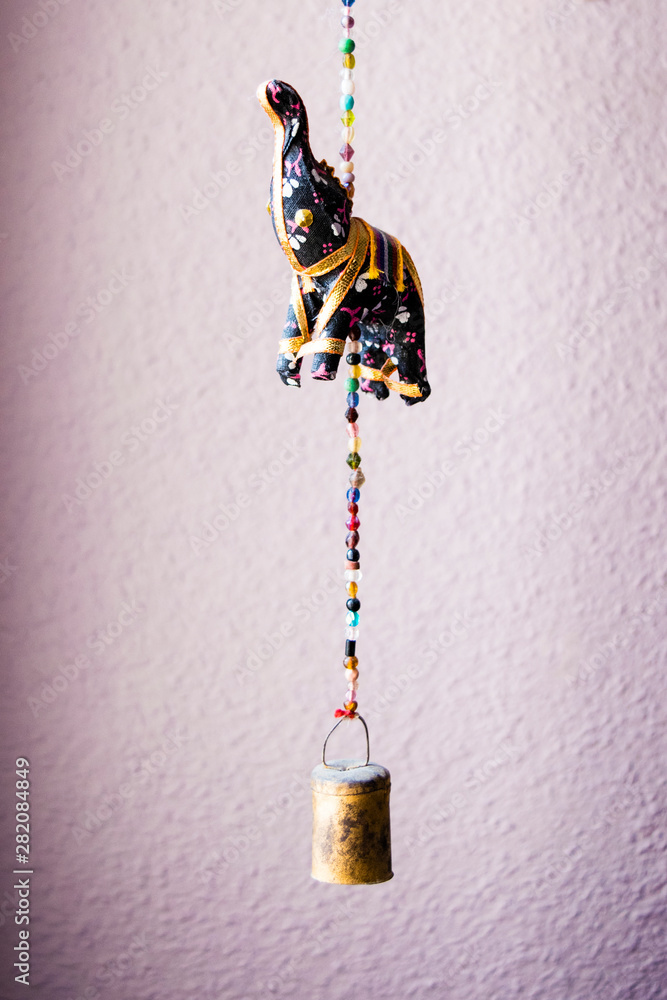 bell and elephant with the trunk up - indian color decoration bell and elephant with the trunk up - indian color decoration
