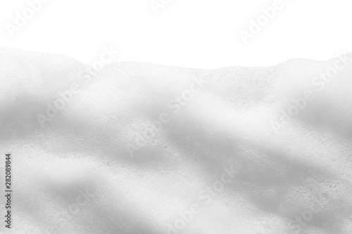 White foam texture isolated on white background. Cosmetic cleanser, soap, shampoo bubbles photo