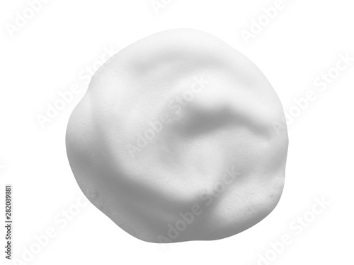 White cleanser foam isolated on white background. Cosmetic soap texture with bubbles. Macro, top view