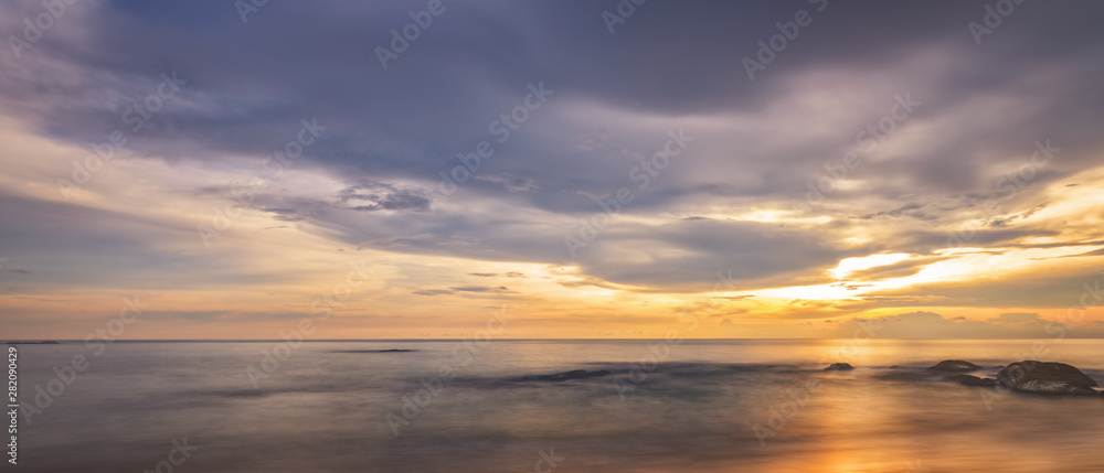 Fototapeta premium Beautiful panoramic view of tropical beach at sunset. Khaolak and Phuket, Thailand.