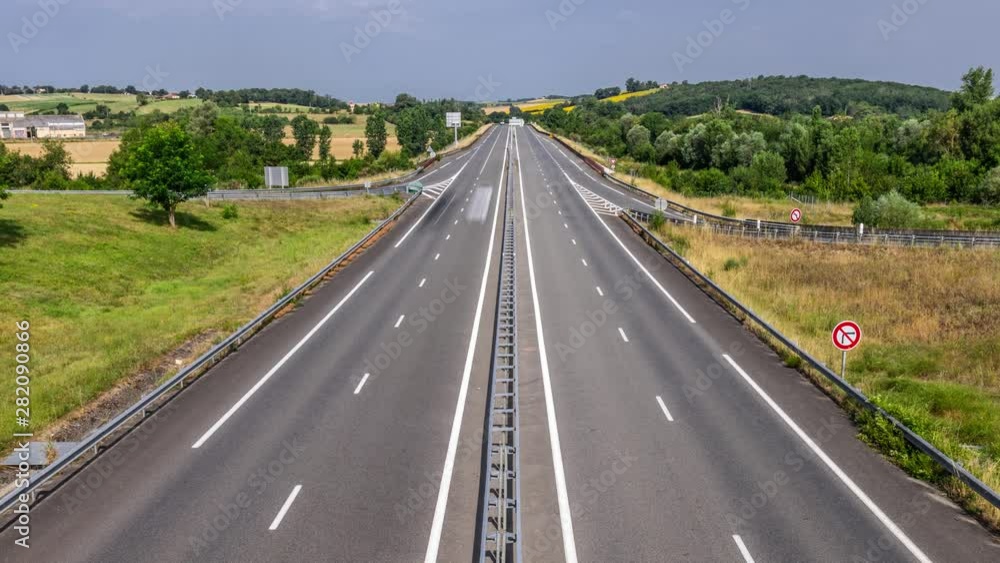 Timelapse of a highway in the countryside with cars Timelapse of a highway in the countryside with cars