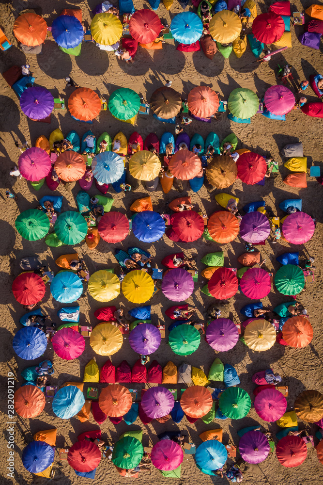 Bali, Indonesia, Top-Down View of Colourful Beach Umbrellas at Tropical Sand Beach