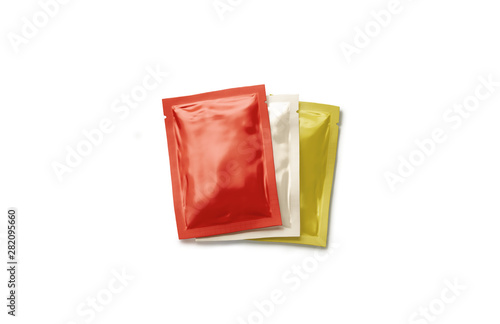 Картината върху платно Blank red, beige and yellow sachet packet stack mockup set, 3d rendering