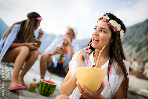 Group of friends enjoying summer vacation. Summer, holidays, vacation and happiness concept