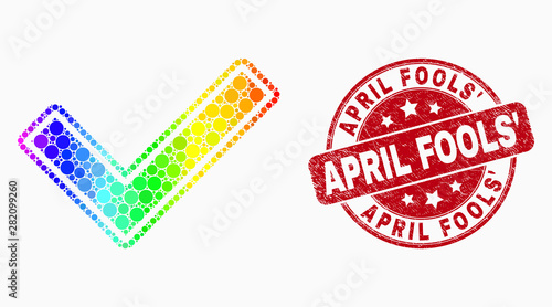 Pixel rainbow gradiented validated tick mosaic icon and April Fools' seal. Red vector rounded textured seal stamp with April Fools' text. Vector combination in flat style.