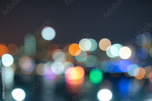 Abstract urban night light bokeh defocused background with sky space area © background photo