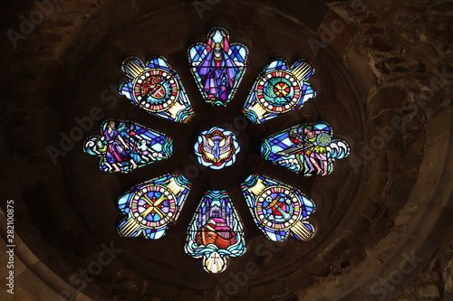 circular stained glass within cathedral 
