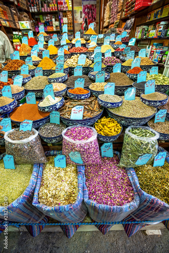 10/05/2019 Kerman,.Kerman Province.Iran, a huge variety of spices and herbs on a counter on a traditional Iranian eastern bazaar
