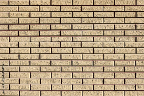 Background freshly laid clean brick wall in a new building  texture