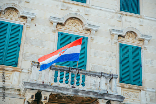 croatian flag on old building balcony