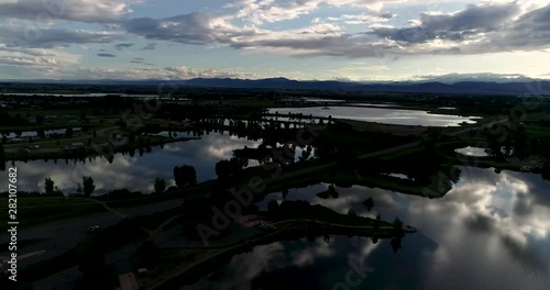 Glorious mountain sunset with reflections in lakes and ponds. Shot by drone from 185ft 4k 60fps photo