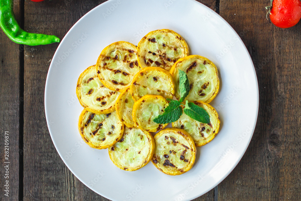 grilled zucchini (snack salad). top food background. copy space