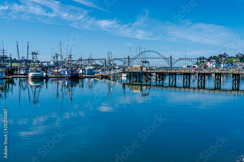 Boats and bridge in Newport, Oregon © TomR