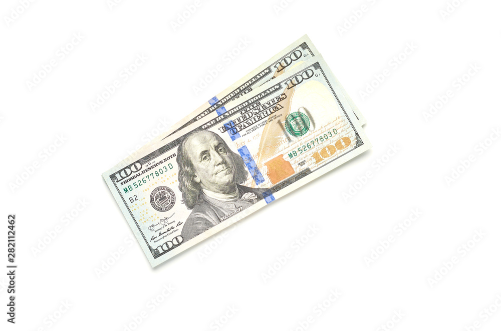 Two hundred dollars in hundred-dollar bills life on a white background. The view from the top. Two hundred dollars in hundred-dollar bills life on a white background. The view from the top.