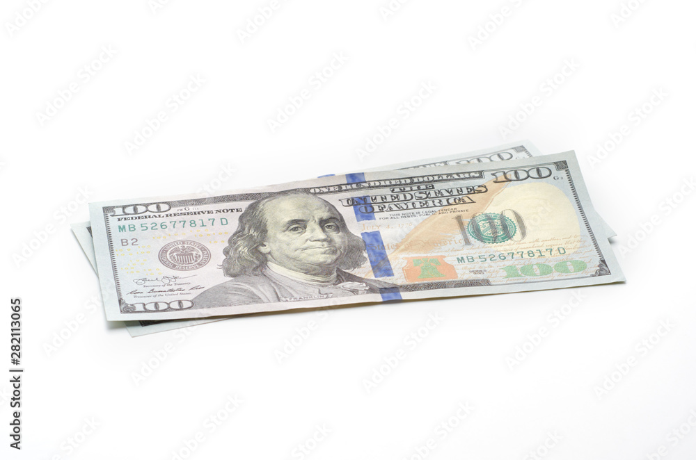 Two hundred dollars in hundred-dollar bills life on a white background. Two hundred dollars in hundred-dollar bills life on a white background.