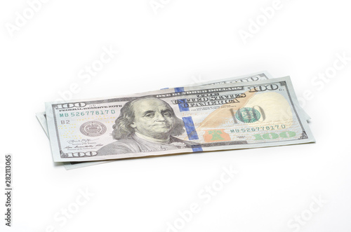 Two hundred dollars in hundred-dollar bills life on a white background.