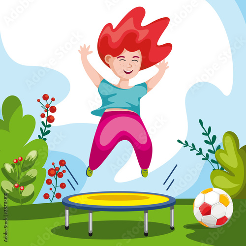 child jumping on trampoline. the girl joyful. Kids leisure in the park. summer time
