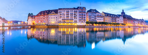 Lucerne. Panorama. Old city embankment and medieval houses at dawn.