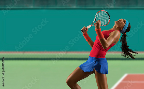 Woman tennis player celebrating winner