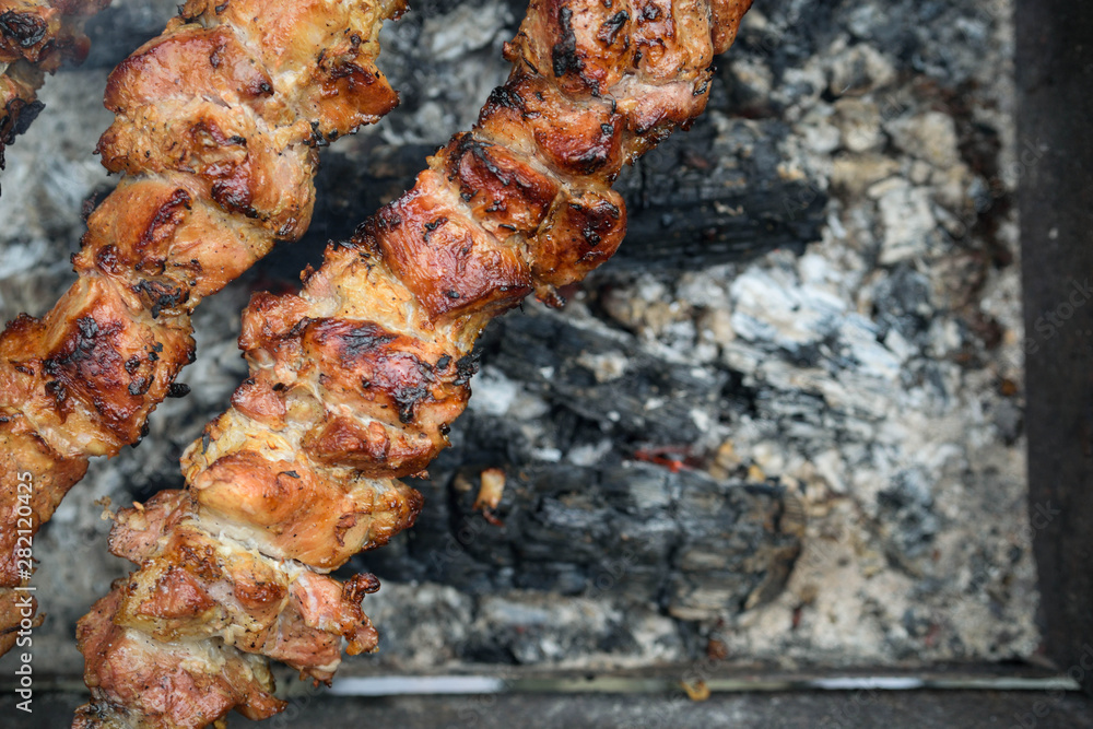 Barbecue.Juicy pieces of meat on skewers Barbecue.Juicy pieces of meat on skewers