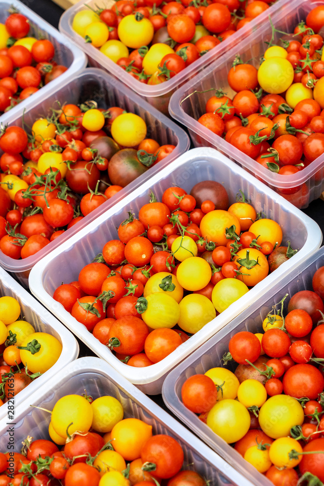 Fresh tomatoes on market stall Fresh tomatoes on market stall